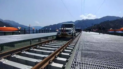 Mahindra Bolero is running on track, leading the inspection trolleys. (Twitter/ @rajtoday) Mahindra Bolero is running on track, leading the inspection trolleys. (Twitter/ @rajtoday)