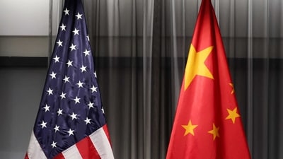 U.S. and China's flags are pictured during a meeting in Zurich, Switzerland. (REUTERS)