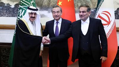 Wang Yi (centre), a member of the Political Bureau of the Communist Party of China’s Central Committee and director of the Office of the Central Foreign Affairs Commission, Ali Shamkhani (right), the secretary of Iran’s Supreme National Security Council, and Minister of State and national security adviser of Saudi Arabia Musaad bin Mohammed Al Aiban pose for pictures during a meeting in Beijing, China. (REUTERS) Wang Yi (centre), a member of the Political Bureau of the Communist Party of China’s Central Committee and director of the Office of the Central Foreign Affairs Commission, Ali Shamkhani (right), the secretary of Iran’s Supreme National Security Council, and Minister of State and national security adviser of Saudi Arabia Musaad bin Mohammed Al Aiban pose for pictures during a meeting in Beijing, China. (REUTERS)