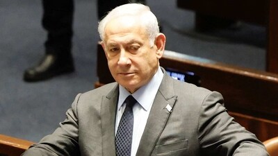 Benjamin Netanyahu said that his administration was striving to make reforms "via broad consensus." (AFP)