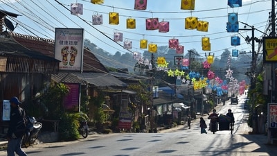 Pai, Thailand - Located in the mountains of northern Thailand, Pai is a small town that has become popular with backpackers and hippies. The town has a relaxed vibe, with plenty of cafes, bars, and guesthouses. Visitors can explore the local waterfalls, hot springs, and caves, or take a yoga class or Thai massage. (Unsplash) Pai, Thailand - Located in the mountains of northern Thailand, Pai is a small town that has become popular with backpackers and hippies. The town has a relaxed vibe, with plenty of cafes, bars, and guesthouses. Visitors can explore the local waterfalls, hot springs, and caves, or take a yoga class or Thai massage. (Unsplash)