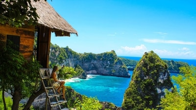 Nusa Penida, Indonesia - Just a short ferry ride from Bali, Nusa Penida is a secluded island paradise that's perfect for travelers seeking a more off-the-beaten-path experience. Visitors can snorkel with manta rays, hike to secluded beaches, or explore the island's many Hindu temples. (Unsplash) Nusa Penida, Indonesia - Just a short ferry ride from Bali, Nusa Penida is a secluded island paradise that's perfect for travelers seeking a more off-the-beaten-path experience. Visitors can snorkel with manta rays, hike to secluded beaches, or explore the island's many Hindu temples. (Unsplash)