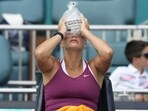 Aryna Sabalenka cools off between sets against Sorana Cirstea of Romania during the Miami Open tennis tournament