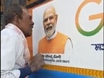 The Karnataka farmer kissed the picture of PM Modi.