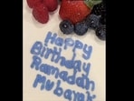 The image shows the cake with the icing “Happy Birthday Ramadan Mubarak.”