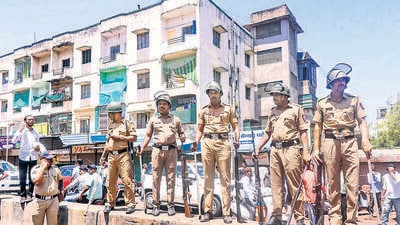 **EDS: TO GO WITH STORY** Aurangabad: Police personnel deployed after a clash between two groups near a Ram temple in Aurangabad, Thursday, March 30, 2023. (PTI Photo)(PTI03_30_2023_000279B) (PTI) **EDS: TO GO WITH STORY** Aurangabad: Police personnel deployed after a clash between two groups near a Ram temple in Aurangabad, Thursday, March 30, 2023. (PTI Photo)(PTI03_30_2023_000279B) (PTI)