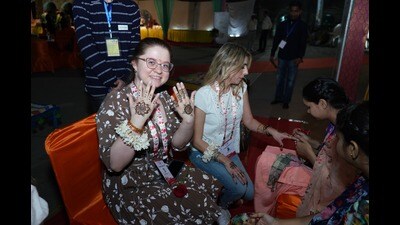 A delegate flaunting her henna-clad hands in Chandigarh on Wednesday. (HT Photo) A delegate flaunting her henna-clad hands in Chandigarh on Wednesday. (HT Photo)
