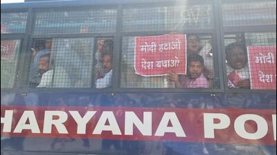 AAP leaders being detained during a protest against the Centre in Karnal on Thursday. (HT Photo)