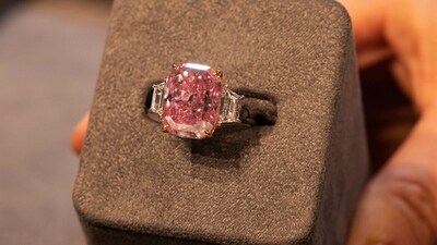 The 10.57-carat stone is being marketed as the most valuable purplish-pink diamond ever brought to auction. (AP)