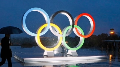 FILE - A display of the Olympic rings is set up on Trocadero plaza that overlooks the Eiffel Tower, after the vote in Lima, Peru, awarding the 2024 Games to the French capital, in Paris, France, Wednesday, Sept. 13, 2017. A proposed French law for the 2024 Paris Olympics that critics contend will open the door for privacy busting video surveillance technology in France and elsewhere in Europe faces an important hurdle Tuesday March 28, 2023 with lawmakers set to vote on it. The bill would legalize the temporary use of so-called "intelligent" surveillance systems to safeguard the Games and Paralympics. (AP Photo/Francois Mori, File) (AP)