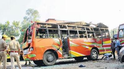 Police personnel gather near a site where a blast occured in an empty bus parked at a bus stand in this file image. (ANI file photo| Arun Jasrotia) Police personnel gather near a site where a blast occured in an empty bus parked at a bus stand in this file image. (ANI file photo| Arun Jasrotia)