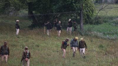 Security personnel during a search operation in Sanyal village near International Border in Hiranagar sector of Kathua district. (PTI)