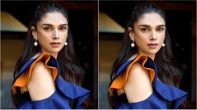 To complete her stunning look, Aditi accessorised with chic pearl drop earrings and black strappy heels. Her gorgeous outfit is a perfect inspiration for a lunch date, showcasing effortless style and elegance. (Instagram/@sanamratansi) To complete her stunning look, Aditi accessorised with chic pearl drop earrings and black strappy heels. Her gorgeous outfit is a perfect inspiration for a lunch date, showcasing effortless style and elegance. (Instagram/@sanamratansi)
