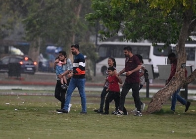 A group walking amid the rainfall in Delhi. (HT Photo/Vipin Kumar) A group walking amid the rainfall in Delhi. (HT Photo/Vipin Kumar)