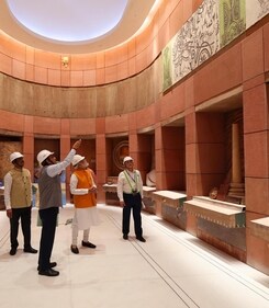 Prime Minister Narendra Modi being briefed about the progress of the construction work at the Parliament complex.