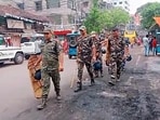 Paramilitary personnel patrol the area where arson occurred during ruckus while 'Rama Navami' procession was underway, in Howrah on Friday. 