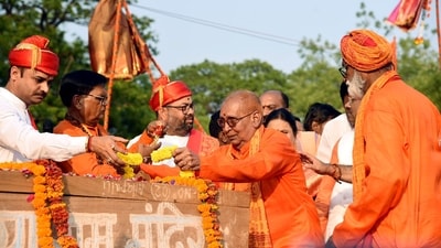 In Turahalli, there was a pandal dotted with saffron flags and yellow marigold flowers and those distributing them sported saffron scarves around their neck. (ANI Photo/For representation) (Nitin Lawate) In Turahalli, there was a pandal dotted with saffron flags and yellow marigold flowers and those distributing them sported saffron scarves around their neck. (ANI Photo/For representation) (Nitin Lawate)