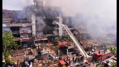 Firefighters douse a fire, which broke out in AR Tower next to Hamraz market, in Kanpur, Friday. (PTI Photo) Firefighters douse a fire, which broke out in AR Tower next to Hamraz market, in Kanpur, Friday. (PTI Photo)