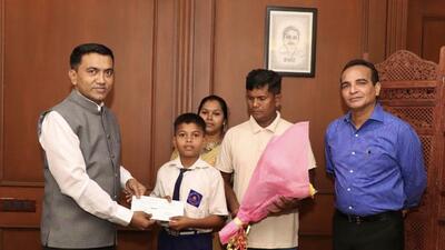 Goa chief minister Pramod Sawant poses for a photograph with Ankurkumar Sanjay Prasad and his family (Twitter/DrPramodPSawant) Goa chief minister Pramod Sawant poses for a photograph with Ankurkumar Sanjay Prasad and his family (Twitter/DrPramodPSawant)