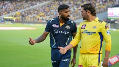 Gujarat Titans' Captain Hardik Pandya and Chennai Super Kings' Captain Mahendra Sinh Dhoni, right, walk to the field before the inauguration of the Indian Premier League (IPL) 2023 in Ahmedabad, India, Friday, March 31, 2023. (AP Photo/Ajit Solanki) (AP) Gujarat Titans' Captain Hardik Pandya and Chennai Super Kings' Captain Mahendra Sinh Dhoni, right, walk to the field before the inauguration of the Indian Premier League (IPL) 2023 in Ahmedabad, India, Friday, March 31, 2023. (AP Photo/Ajit Solanki) (AP)