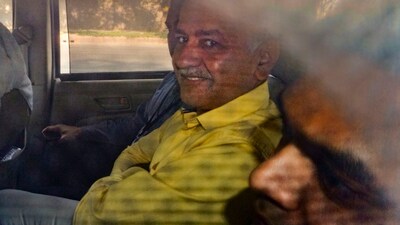 Delhi Deputy Chief Minister Manish Sisodia being taken to Rouse Avenue Court by CBI officials in the excise policy case, in New Delhi. (PTI) Delhi Deputy Chief Minister Manish Sisodia being taken to Rouse Avenue Court by CBI officials in the excise policy case, in New Delhi. (PTI)