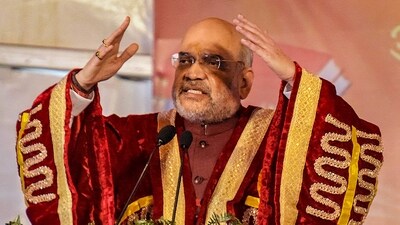 Soon after landing at the Bhalla College helipad here, Amit Shah was faced with denunciatory slogans by Congress workers at Parashuram Chowk against over the disqualification of Rahul Gandhi as MP. (PTI) Soon after landing at the Bhalla College helipad here, Amit Shah was faced with denunciatory slogans by Congress workers at Parashuram Chowk against over the disqualification of Rahul Gandhi as MP. (PTI)