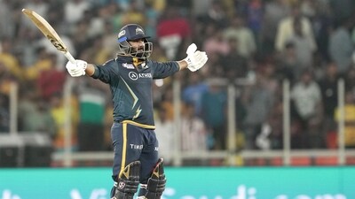 Rahul Tewatia and Rashid Khan provided the perfect finishing act after Shubman Gill's half century as Gujarat Titans chased down a target of 179 to win by five wickets (PTI) Rahul Tewatia and Rashid Khan provided the perfect finishing act after Shubman Gill's half century as Gujarat Titans chased down a target of 179 to win by five wickets (PTI)