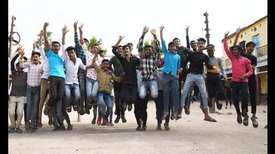 Students celebrate in Patna after the matric examination results were declared. (Santosh Kumar/HT Photo)