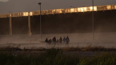 Migrants seen at the US border. (AFP Representational) Migrants seen at the US border. (AFP Representational)
