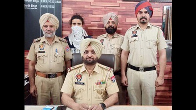 The accused in police custody in Ludhiana on Friday. (HT Photo)