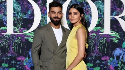 Virat Kohli, on the other hand, looked handsome in a khaki-toned suit and white shirt. He completed his stylish look with comfy white sneakers.&nbsp; (Instagram/@anushkasharma)