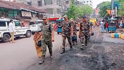 Paramilitary personnel patrol the area where arson occurred during ruckus while 'Rama Navami' procession was underway, in Howrah on Friday. (ANI ) Paramilitary personnel patrol the area where arson occurred during ruckus while 'Rama Navami' procession was underway, in Howrah on Friday. (ANI )