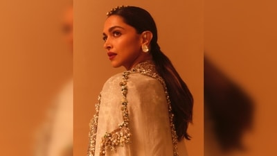 Deepika Padukone's luxury couture comprises a heavily embellished ivory pantsuit and a long cape. (Instagram/@deepikapadukone) Deepika Padukone's luxury couture comprises a heavily embellished ivory pantsuit and a long cape. (Instagram/@deepikapadukone)