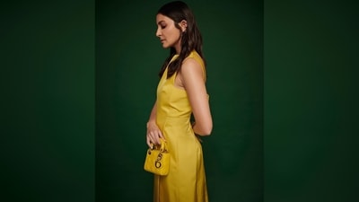 Anushka Sharma's dress features an open back with tie-up detailing and ankle length hemline. (Instagram/@anushkasharma)