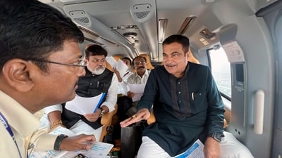 Union minister Nitin Gadkari with Maharashtra industries minister Uday Samant conducts an aerial survey of the Mumbai-Goa National Highway No.66, on Thursday. (Nitin Gadkari / Twitter) Union minister Nitin Gadkari with Maharashtra industries minister Uday Samant conducts an aerial survey of the Mumbai-Goa National Highway No.66, on Thursday. (Nitin Gadkari / Twitter)