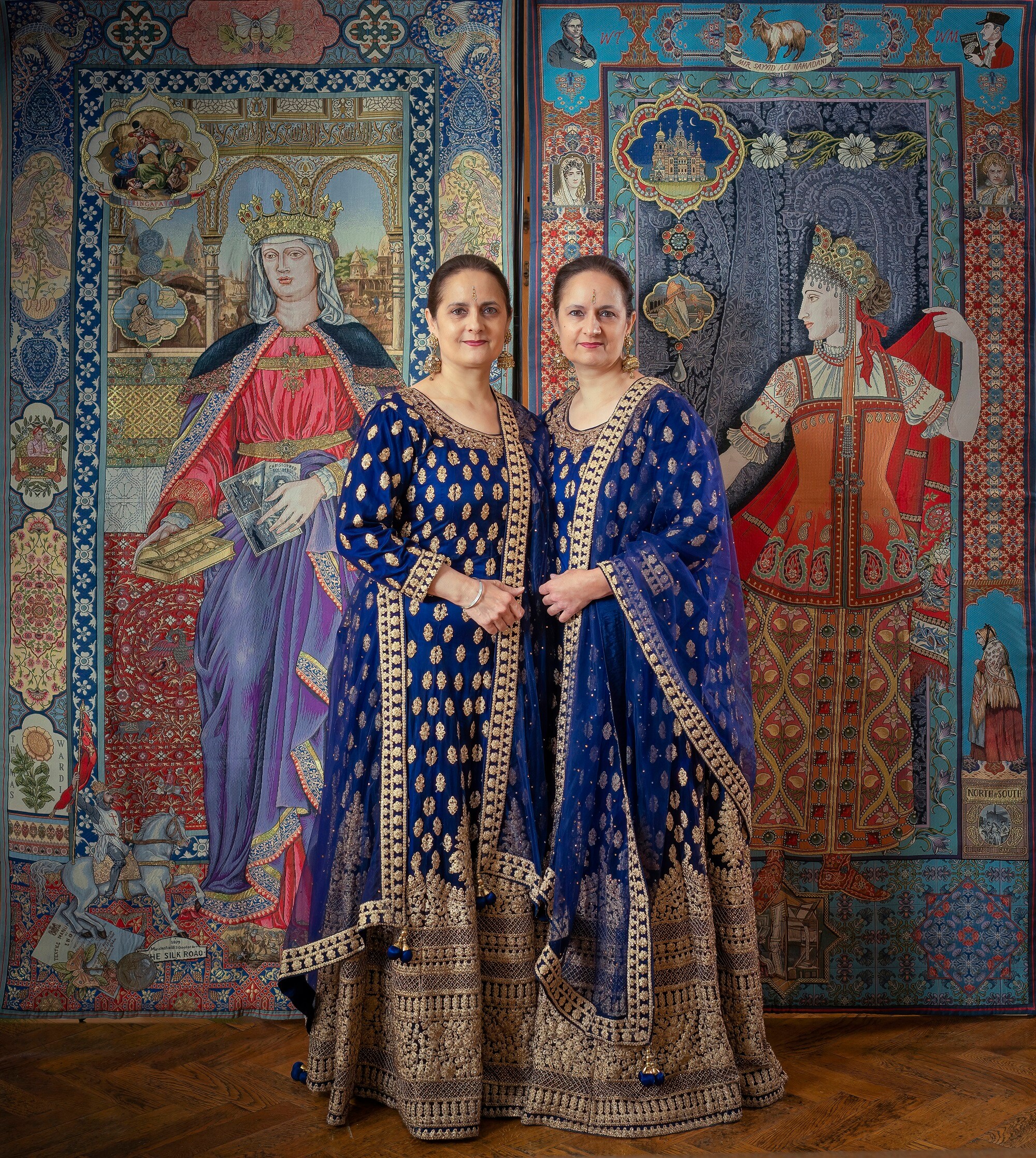 The Singh Twins with a section of their mural. (Image courtesy Manchester Museum) The Singh Twins with a section of their mural. (Image courtesy Manchester Museum)