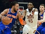  New York Knicks guard Jalen Brunson (11) drives to the basket against Cleveland Cavaliers guard Donovan Mitchell (45) during the first half at Rocket Mortgage FieldHouse. 