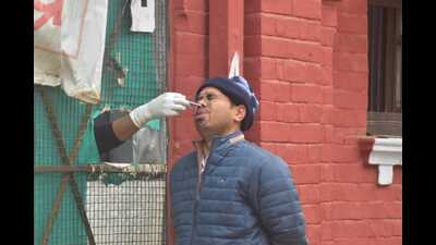 A man giving a swab sample at a Covid-19 testing centre in Prayagraj. (HT FILE PHOTO) A man giving a swab sample at a Covid-19 testing centre in Prayagraj. (HT FILE PHOTO)