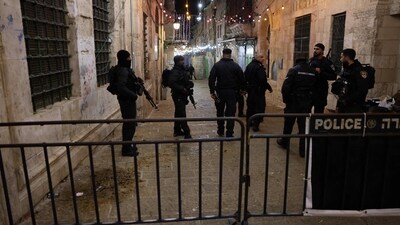 Israeli police forces deploy in east Jerusalem after a reported shooting incident. (AFP) Israeli police forces deploy in east Jerusalem after a reported shooting incident. (AFP)