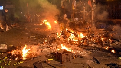 Vehicles set on fire by miscreants during clashes between two groups at Kajipara in Howrah district on Thursday, (PTI) Vehicles set on fire by miscreants during clashes between two groups at Kajipara in Howrah district on Thursday, (PTI)