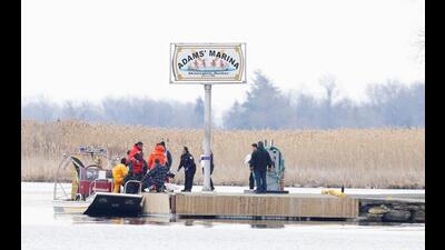 Police and firemen carry a bag off their search boat from the marshland in Akwesasne, Quebec, Canada March 31, 2023. (REUTERS) Police and firemen carry a bag off their search boat from the marshland in Akwesasne, Quebec, Canada March 31, 2023. (REUTERS)
