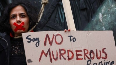 A supporter of the Iranian women life freedom movement takes part in a demonstration, during the Munich Security Conference (MSC) in Munich, Germany February 18. (REUTERS)