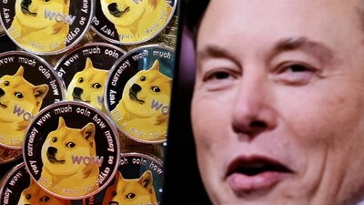 A photo of Elon Musk is displayed on a smartphone placed on representations of cryptocurrency Dogecoin. (Reuters) A photo of Elon Musk is displayed on a smartphone placed on representations of cryptocurrency Dogecoin. (Reuters)