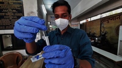 Thane, India - March 31, 2023: A health worker collects swab samples of citizens for Covid-19 test as cases have increased in the city, at TMC's C.R. Wadia Hospital, in Thane, India, on Friday, March 31, 2023. (Praful Gangurde/HT Photo) (HT PHOTO) Thane, India - March 31, 2023: A health worker collects swab samples of citizens for Covid-19 test as cases have increased in the city, at TMC's C.R. Wadia Hospital, in Thane, India, on Friday, March 31, 2023. (Praful Gangurde/HT Photo) (HT PHOTO)