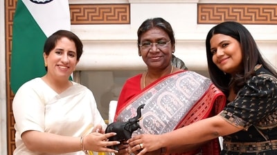 President Droupadi Murmu with Oscar 2023 winning documentary short film The Elephant Whisperers producer Guneet Monga and director Kartiki Gonsalves. (PTI) President Droupadi Murmu with Oscar 2023 winning documentary short film The Elephant Whisperers producer Guneet Monga and director Kartiki Gonsalves. (PTI)