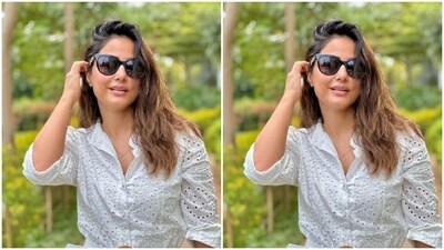 In sleek white stilettos and tinted shades, Hina further accessorised her look for the day. (Instagram/@realhinakhan) In sleek white stilettos and tinted shades, Hina further accessorised her look for the day. (Instagram/@realhinakhan)