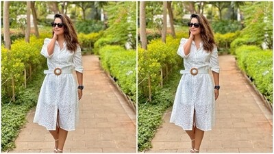 Hina wore her tresses in messy wavy curls with a side part as she decked up in contoured cheeks and a shade of nude lipstick to pose for the pictures. (Instagram/@realhinakhan) Hina wore her tresses in messy wavy curls with a side part as she decked up in contoured cheeks and a shade of nude lipstick to pose for the pictures. (Instagram/@realhinakhan)