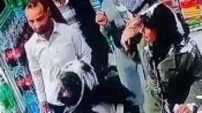 Iran Yoghurt Attack: In the video a mother and daughter can be seen at a shop counter. Iran Yoghurt Attack: In the video a mother and daughter can be seen at a shop counter.