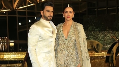 Ranveer Singh and Deepika Padukone quashed all rumours of tiff between them as they posed happily for the photographers at the NMACC event. They smiled, laughed and held hands as they posed together. (Varinder Chawla) Ranveer Singh and Deepika Padukone quashed all rumours of tiff between them as they posed happily for the photographers at the NMACC event. They smiled, laughed and held hands as they posed together. (Varinder Chawla)