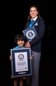 The image shows the 4-year-old boy with an Guinness World Records official. (Guinness World Records) The image shows the 4-year-old boy with an Guinness World Records official. (Guinness World Records)